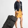 Eastpak TRANVERZ L CORE COLORS Valise à Roulettes Black Denim Unisex -Eastpak Sacs Magasin 133e1f3ef52341078a77b4b5f4799732